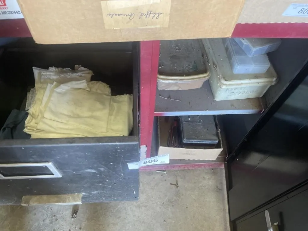 Metal cabinet with hardware and cloth