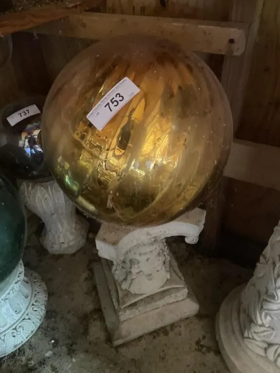 Golden gazing ball and stand