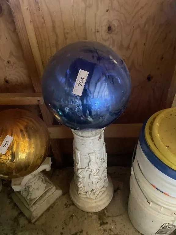 Blue gazing ball and pedestal