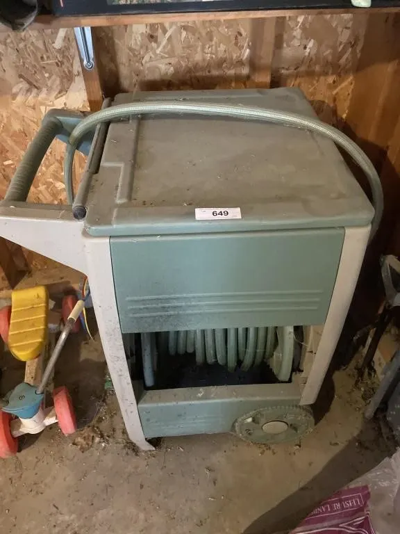 Garden hose and cabinet reel