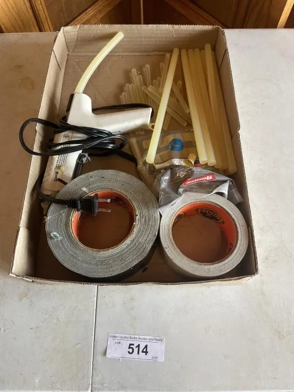 Gorilla tape, hot glue gun, and glue sticks