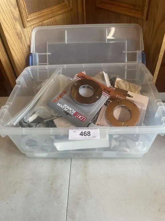 Tote of hardware - door, knobs, floor flange,