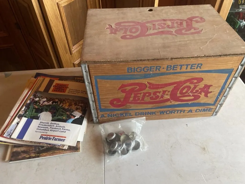 Wooden Pepsi crate, beer bottle caps, farm