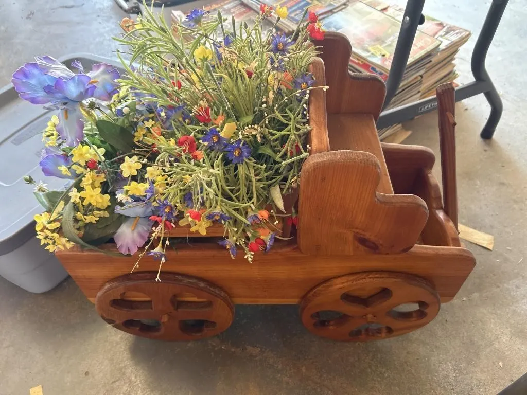 Wooden wagon with fake flowers
