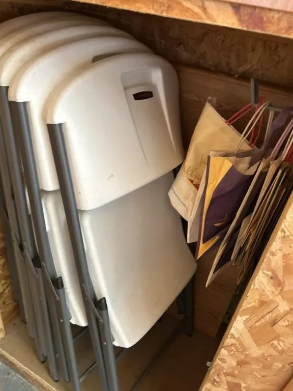 Plastic folding chair and bags