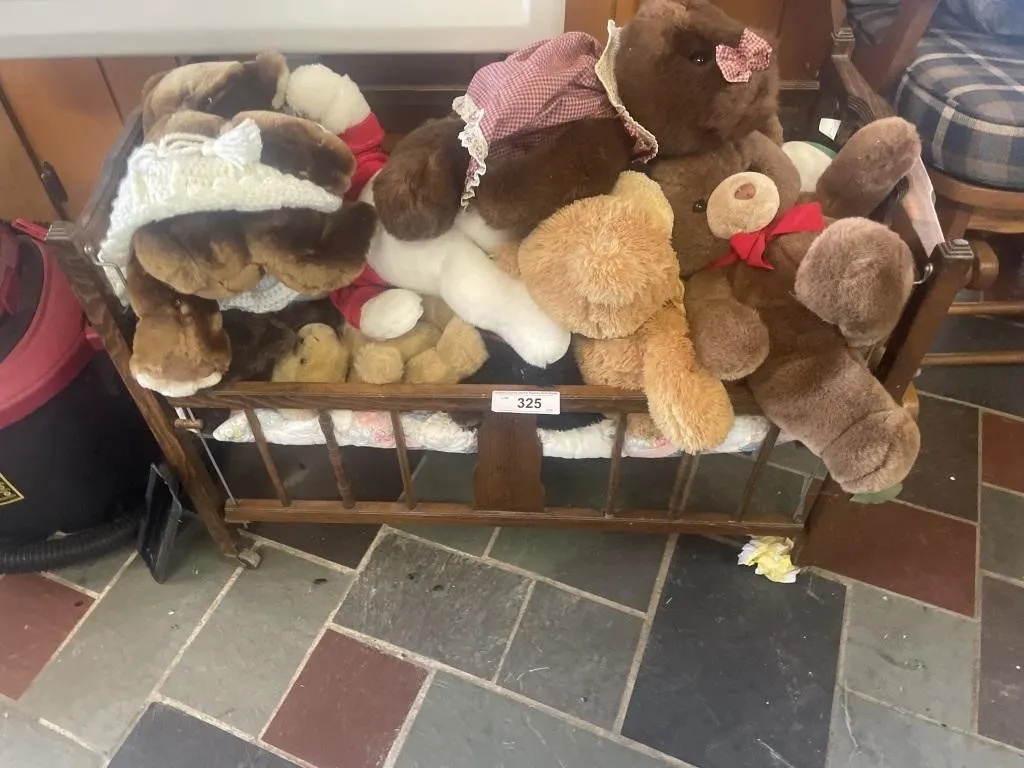 Wooden crib with teddy bears