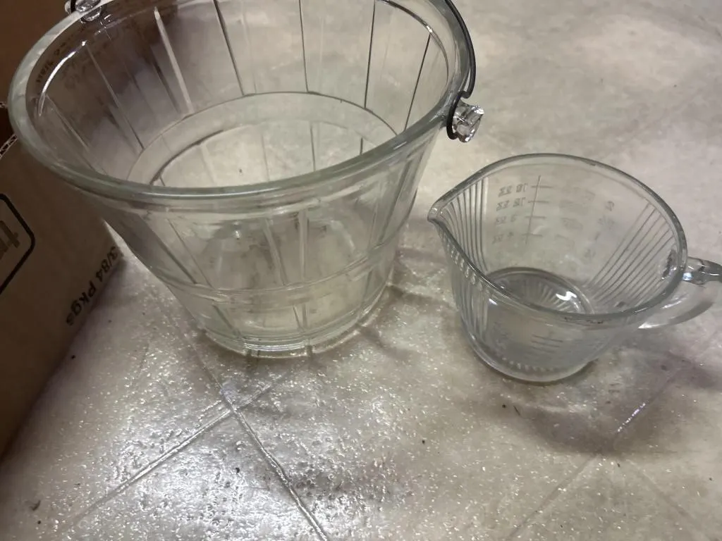 Measuring cup and ice cream bucket