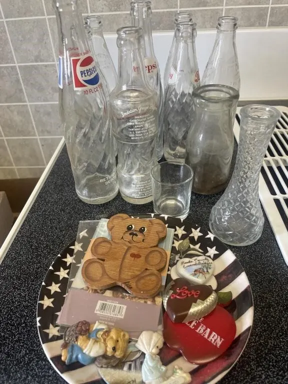 Pop bottles, decorative plate, magnets