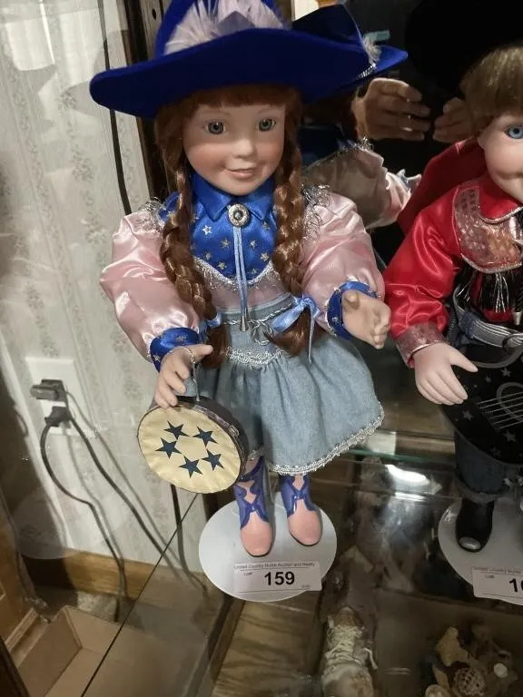 Ceramic western girl doll with tambourine