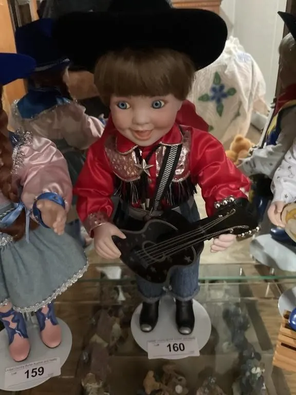 Ceramic Doll Playing Guitar.