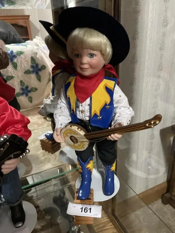 Ceramic western banjo player doll