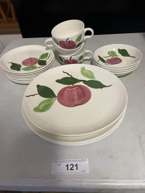Ceramic apple plate, mug, saucers, and bowls