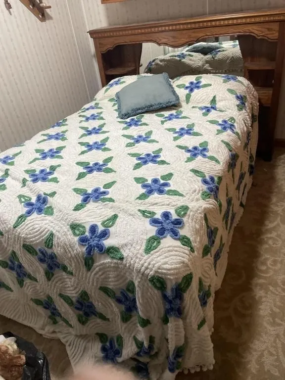 wooden headboard with box springs, mattress,