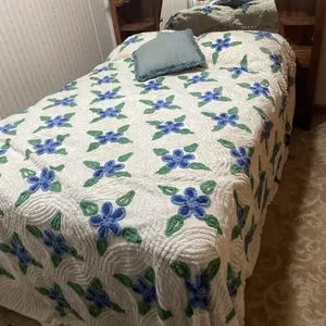 wooden headboard with box springs, mattress,