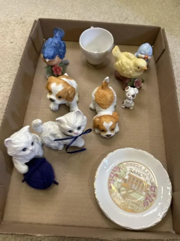 Ceramic birds, dogs, cats, teacup, and plate