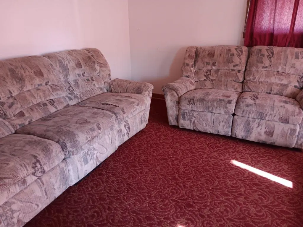 Reclining sofa approximately 84x32x 36 & love