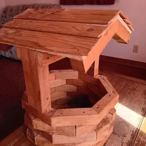 Wooden wishing well approximately 15x15x20