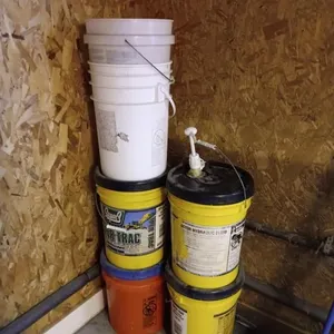 Several 5 gallon buckets