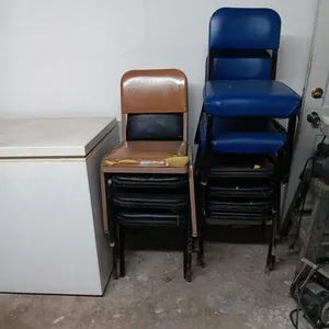 Ten Metal Chairs.