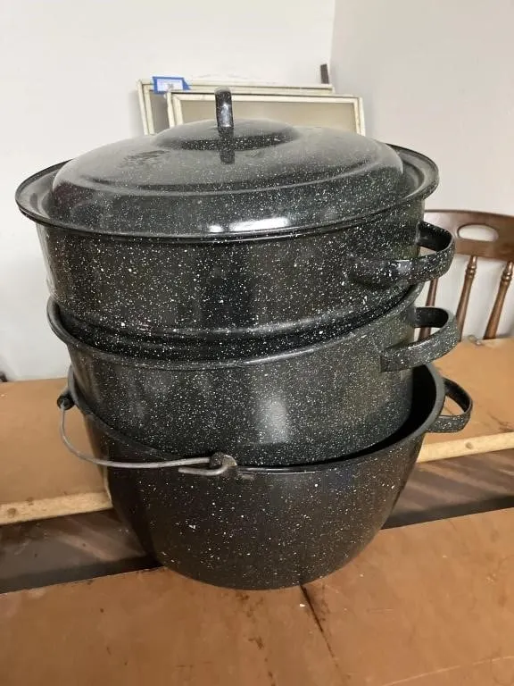 Enamelware black speckled canning pot.