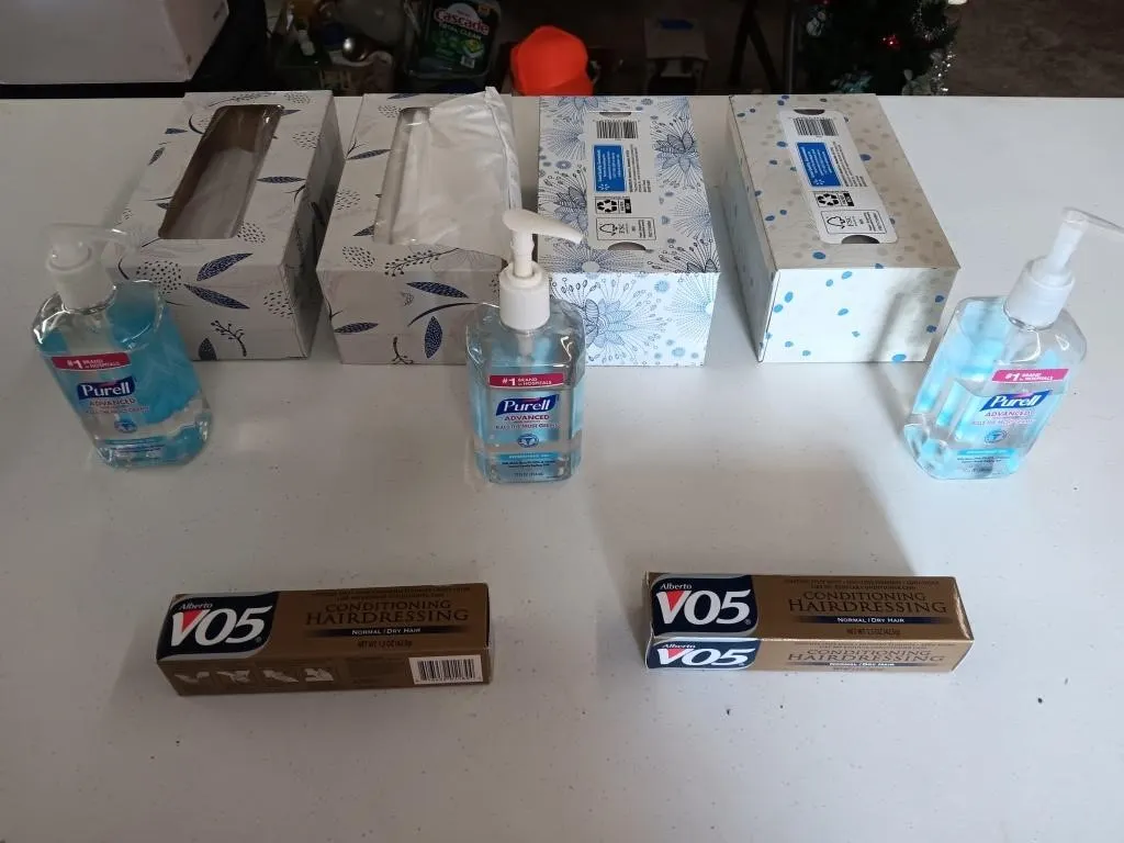 Kleenex,hand sanitizer and Vo5