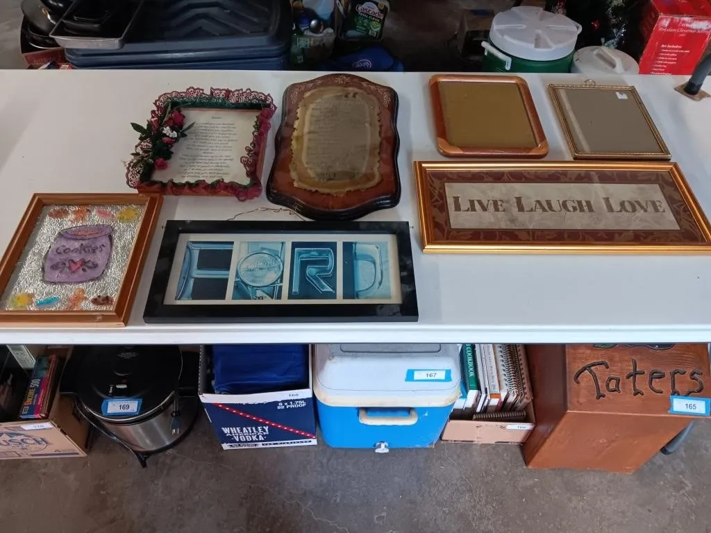 Assortment of pictures and frames.
(Ten
