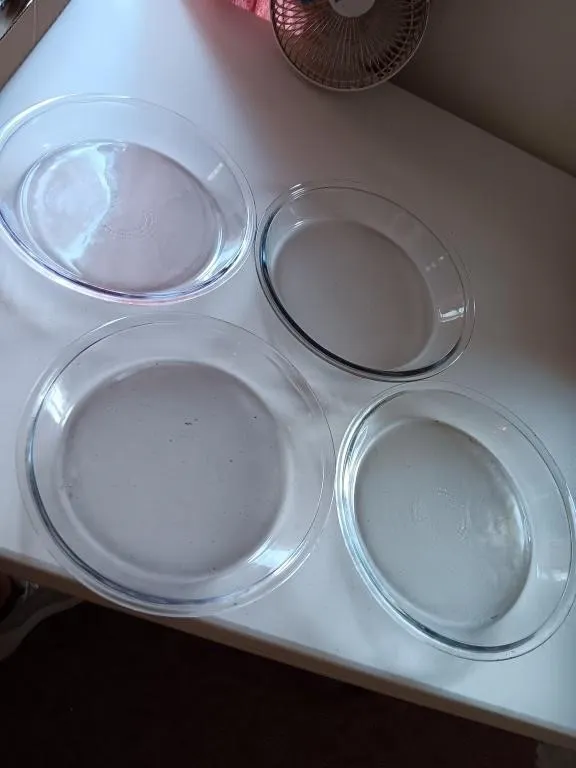 Four glass pie plates. 9" made in USA. No chips