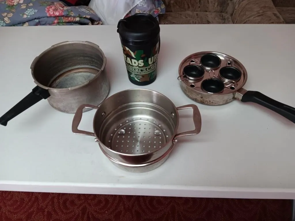 Kitchen pans and insulated cup.
(Egg