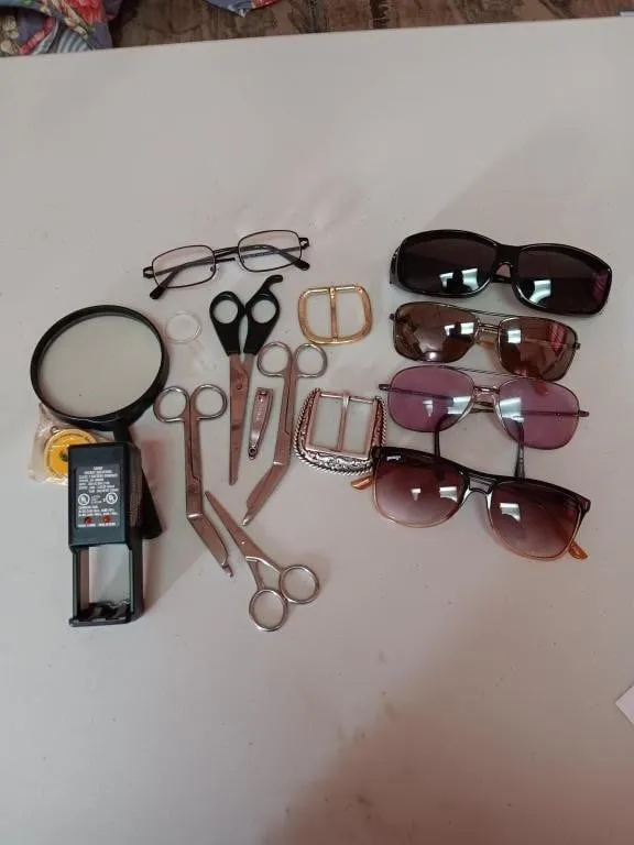 Sunglasses, readers, magnifiers, battery charger