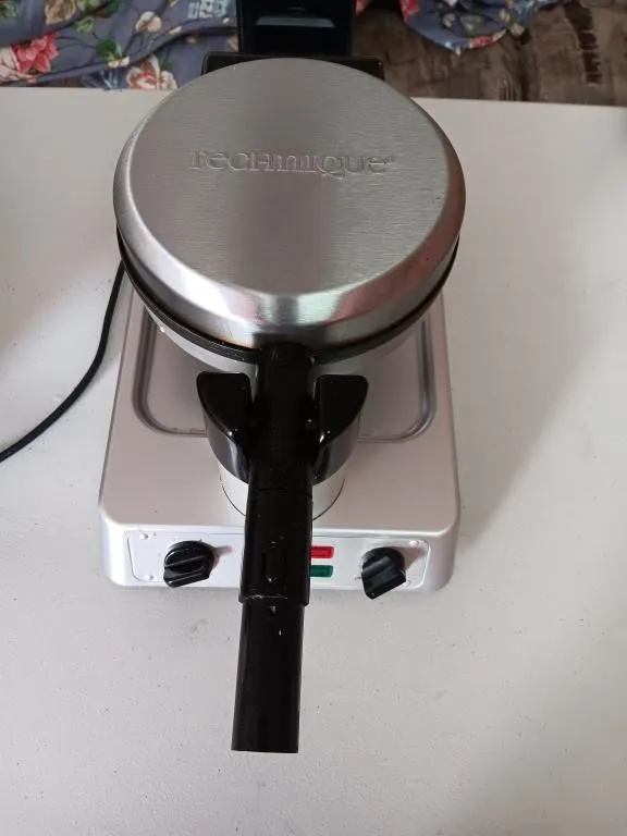 Technique Brand Waffle Maker. Powered on.