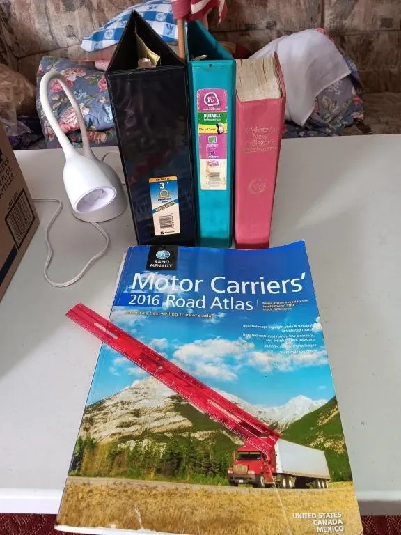 Atlas's, maps, ruler, desk lamp works, binders,