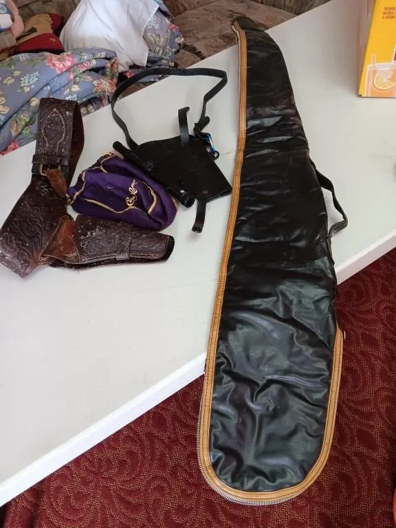Gun holsters, long rifle soft case, scope, bag.