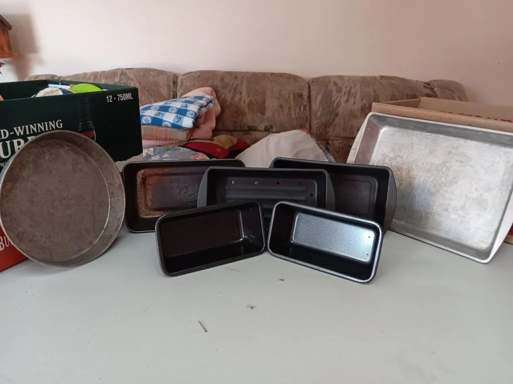 Pie, bread loaf, baking pans.