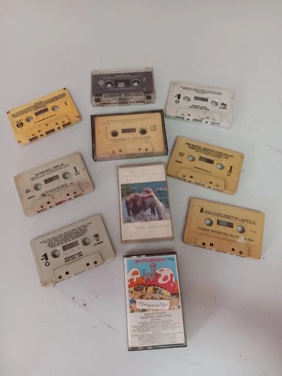 Cassette Tapes. Older country and Smurfs.