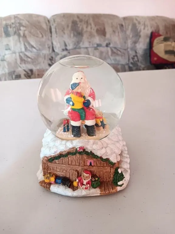 Christmas Snow globe, Santa Claus holding child.