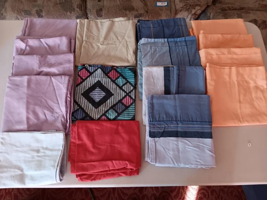 Various Queen Bedding.
16 pillow cases.
2