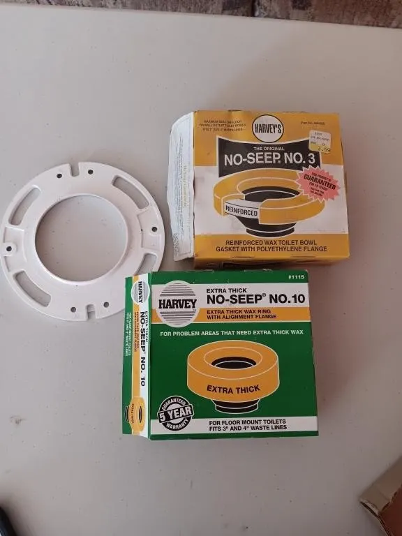 Toilet flange and 2 wax rings.