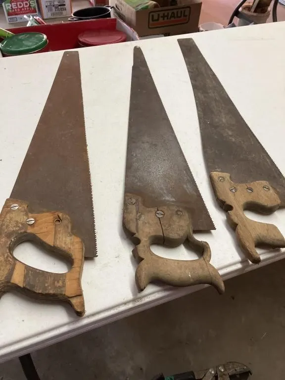 Three handsaws