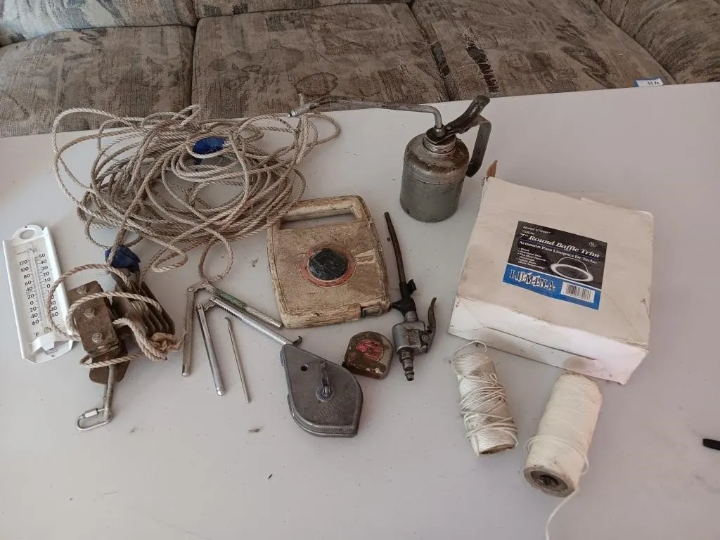 Variety of items. String, Oil Can, Nut Cracker