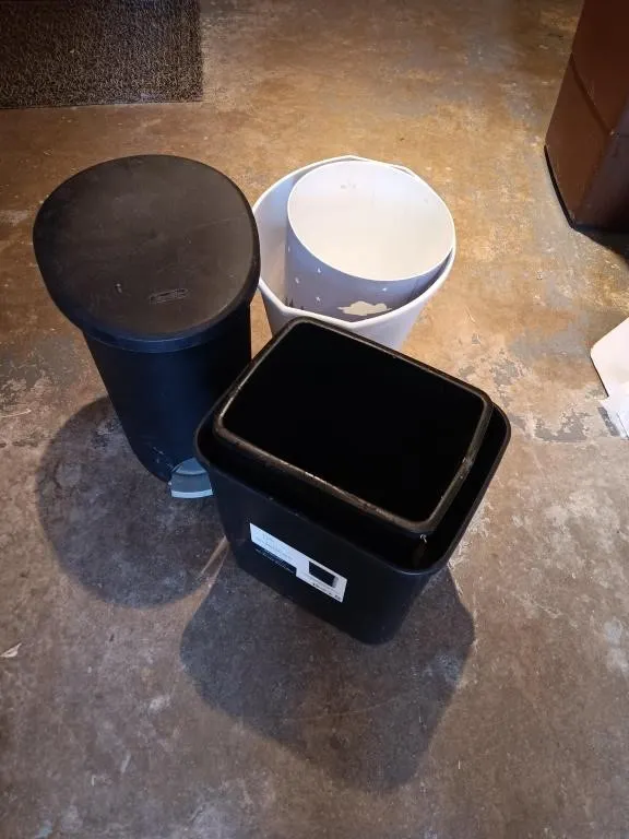 Group of small trash cans.