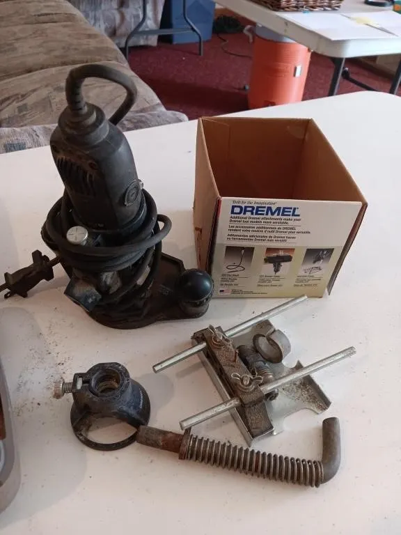 Dremel tool and attachments. Untested.