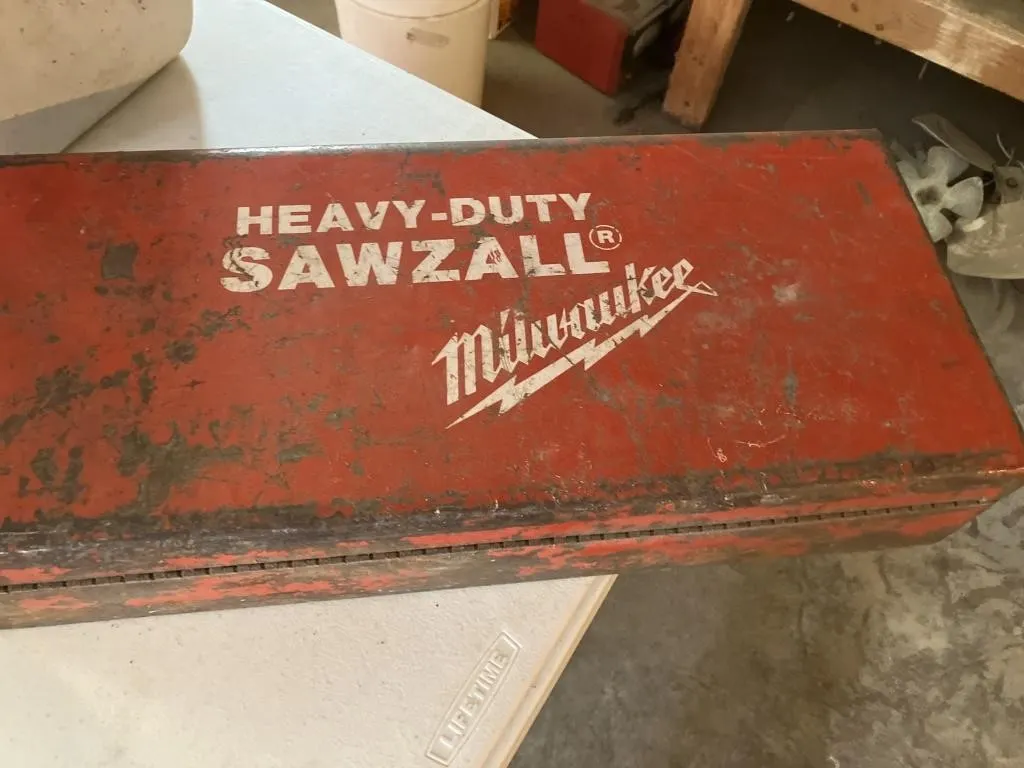 Milwaukee heavy-duty sawzall with metal storage