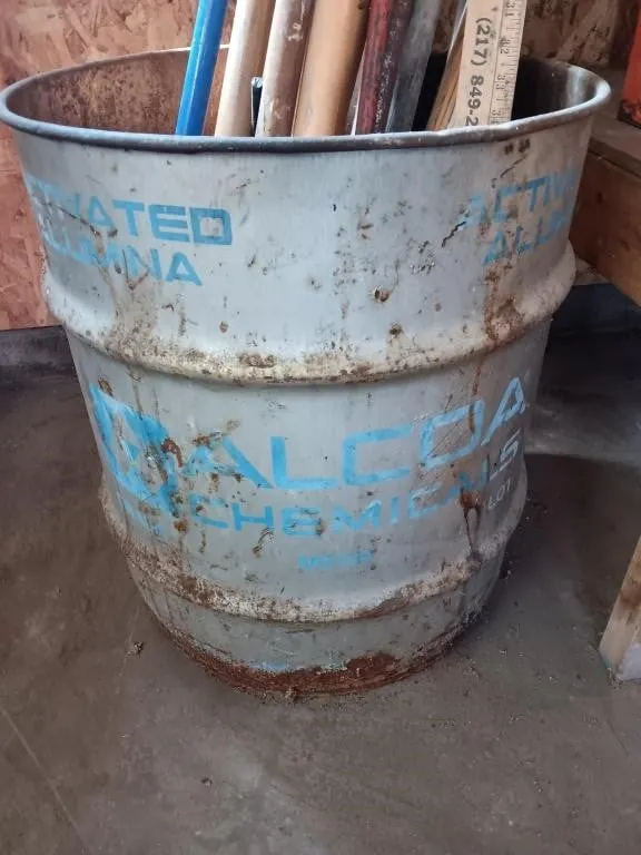 Metal half barrel and assortment of