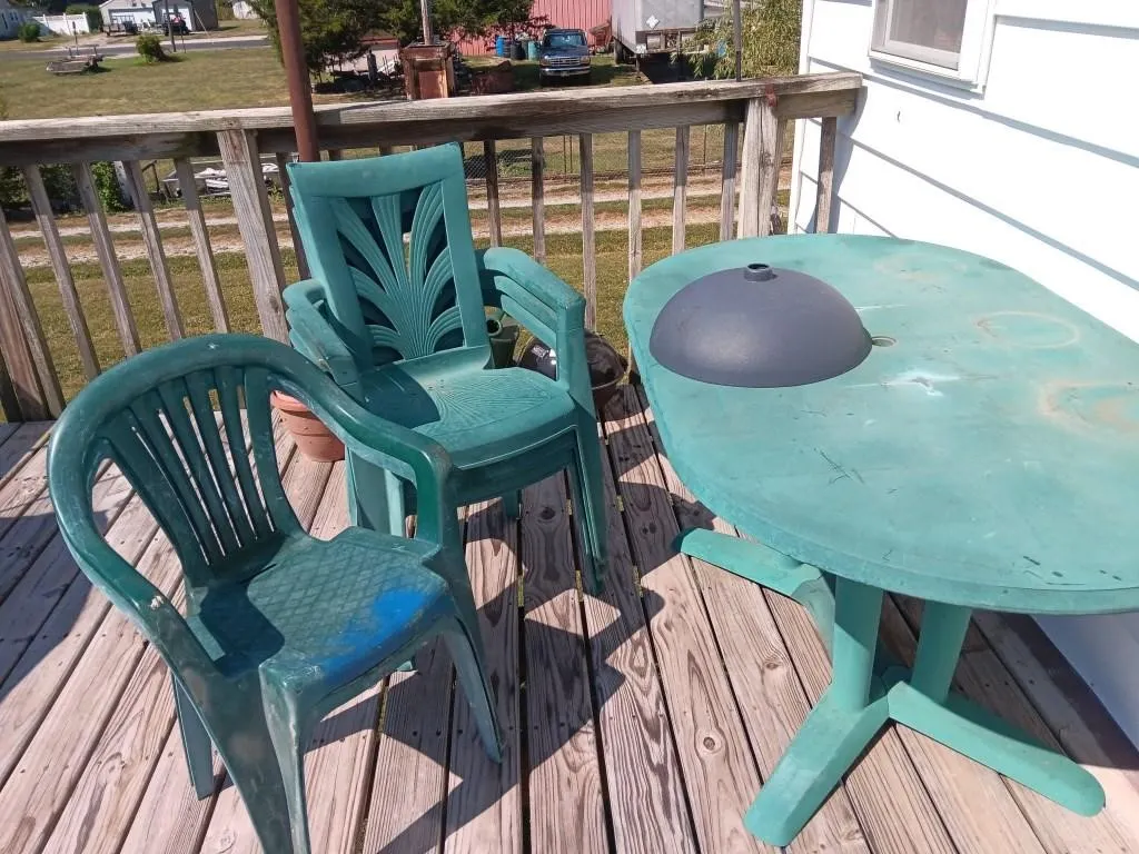 Plastic Patio Table With Five Chairs & Umbrella
