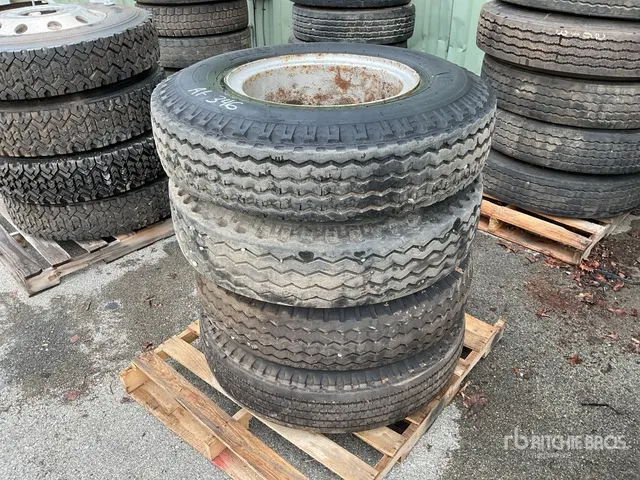 Quantity of (4) 10-20 Tires w/Wheels