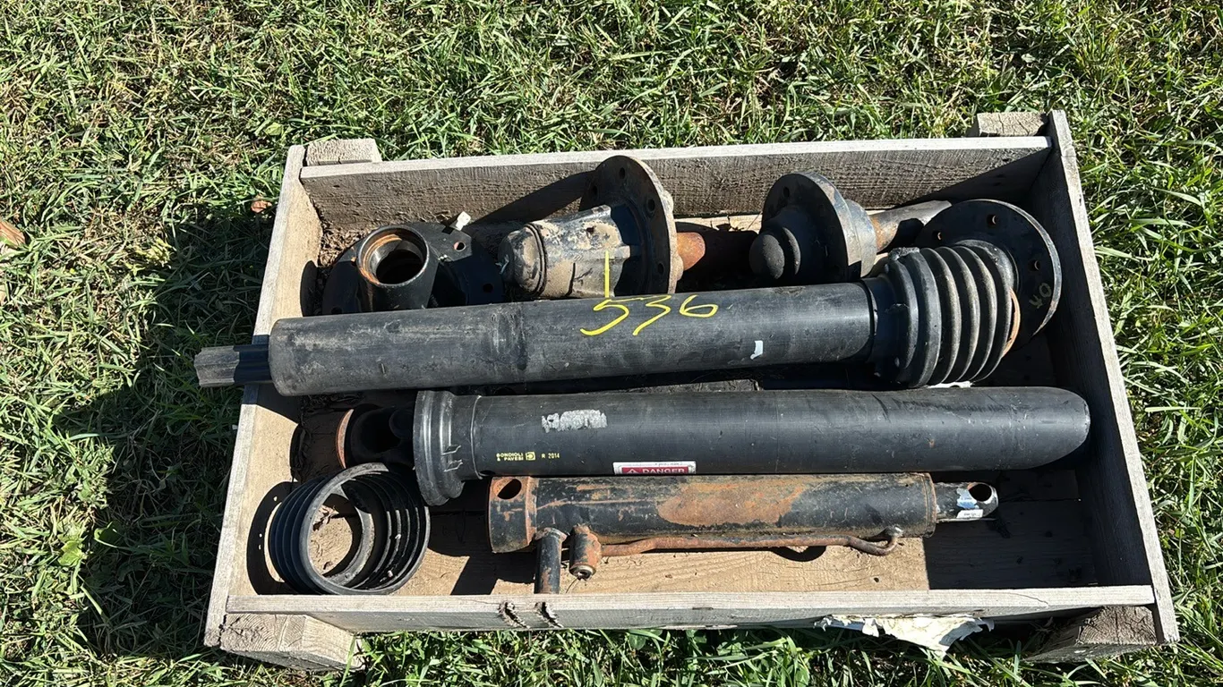 (2) 6 Bolt Hubs, (2) 8 Bolt Hubs, (2) Macdon Cylinders, assorted PTOs