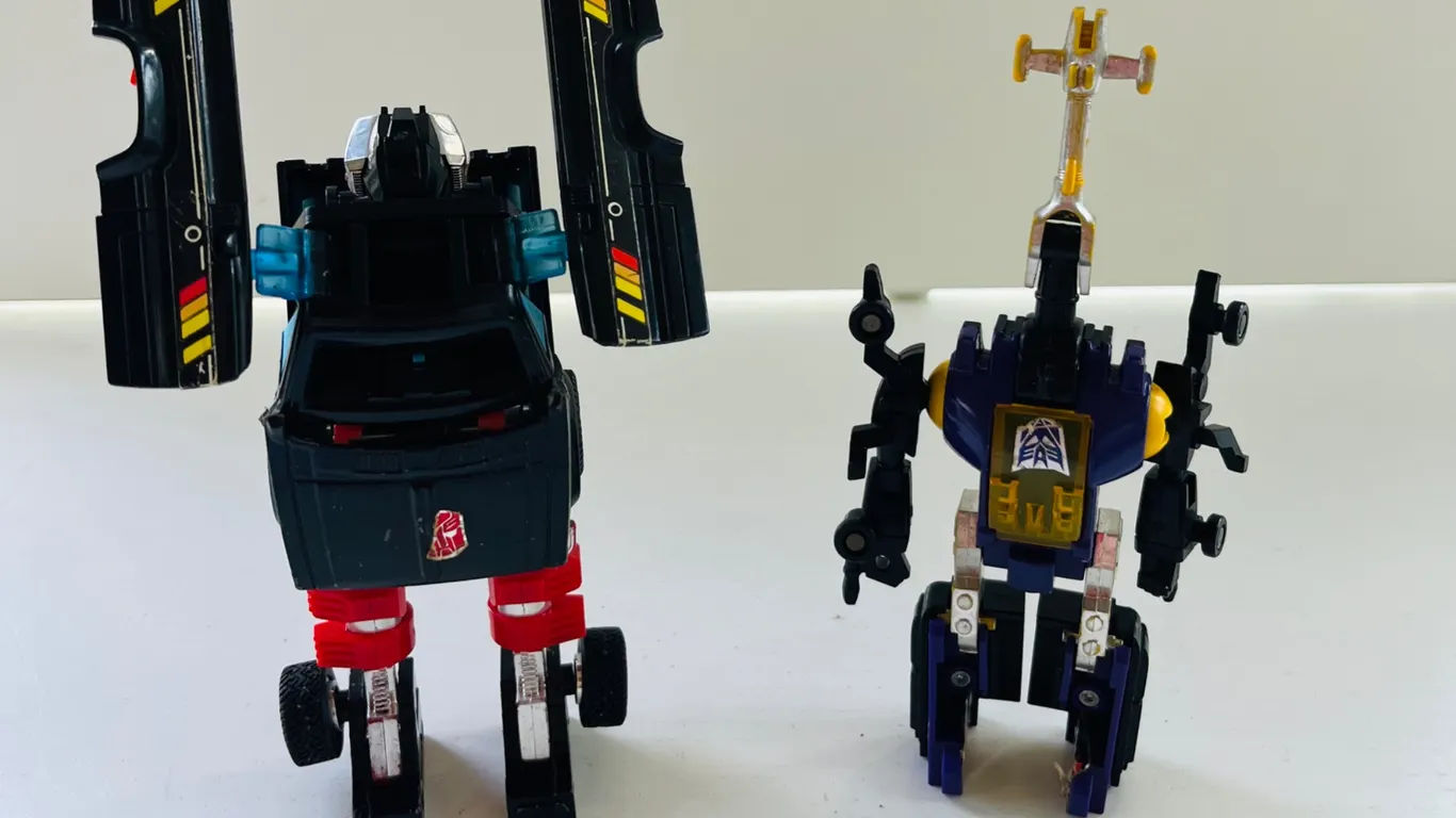Two Vintage Transformers G1 Style Action Figures