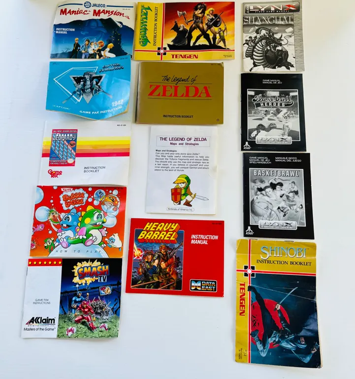 Collection of Vintage Video Game Instruction Booklets, Maps, and Poster