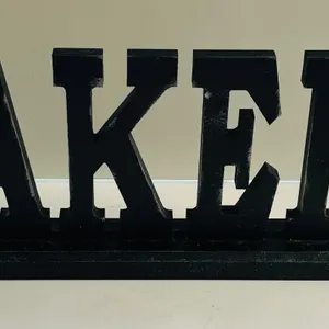 Distressed Black Wooden "BAKERY" Sign
