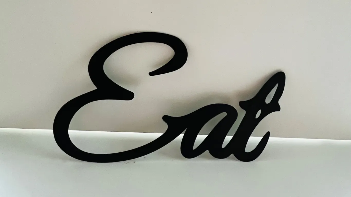 Black Metal "Eat" Script Wall Art